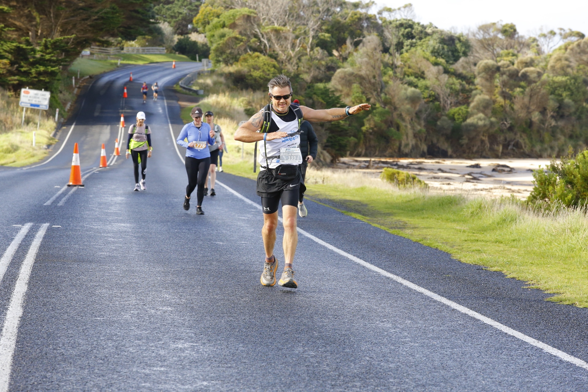 Jason competing in a running event to raise awareness for mental health