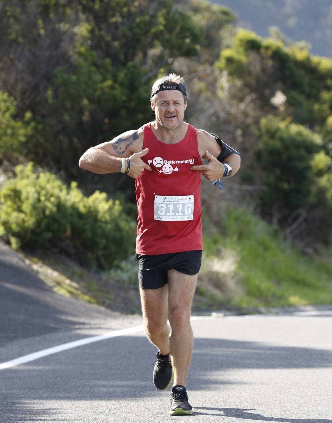 Jason competing in a running event to raise awareness for mental health